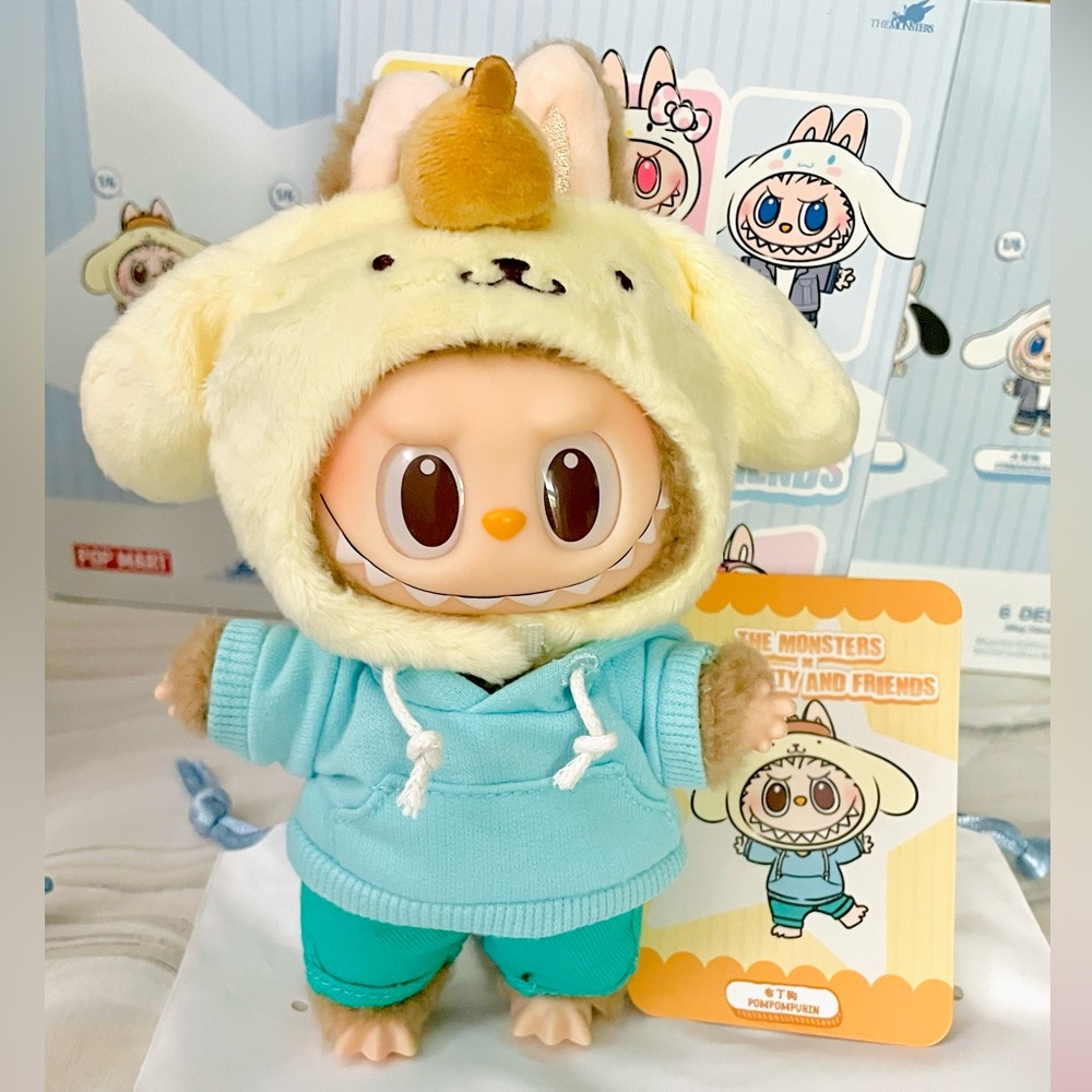 Opened box of POPMART Labubu Hello Kitty and Friends Plush Pendant - Pompompurin
